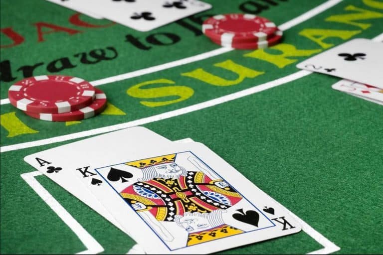 Elegant baccarat table guide on 89999bet with esports inspired red styling